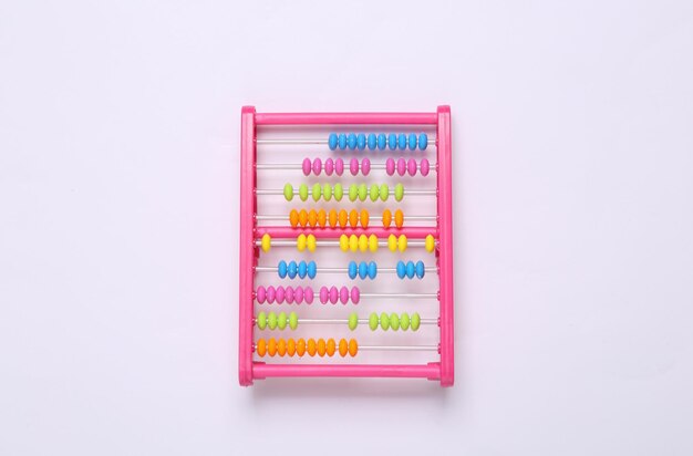 Childrens toy abacus on white background