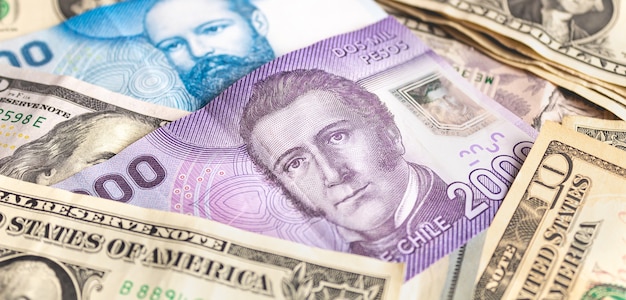 Chile money and united states dollar in photography for foreign exchange market concept