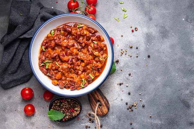 chili con carne beans, corn, meat, tomato healthy meal food snack on the table copy space food