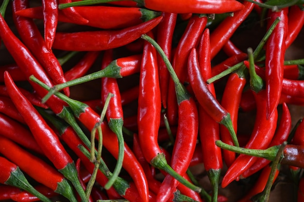 Chili pepper Red hot chilli peppers pattern texture background Close up group of ripe red chilli