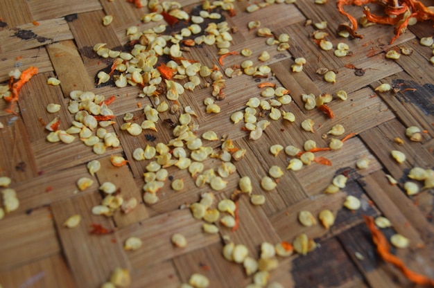 chili seeds on bamboo straw