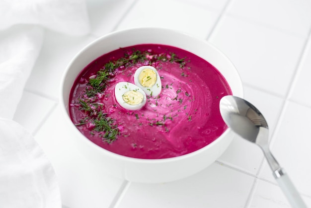 Chilled beetroot soup with sour cream and quail egg