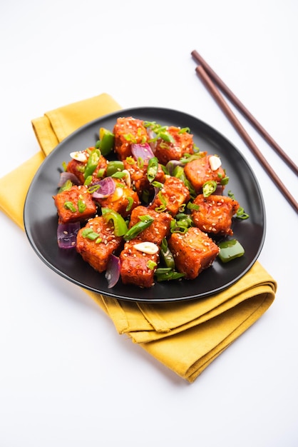 Chilli paneer dry is made using cottage cheese, Indo chinese food