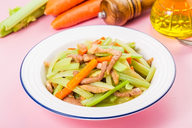 Chinese Cuisine fried pork with celery