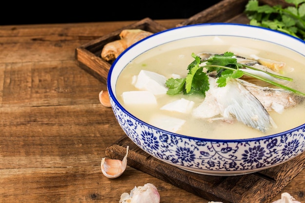 Chinese fooddelicious fish head soup Silver carp head soup