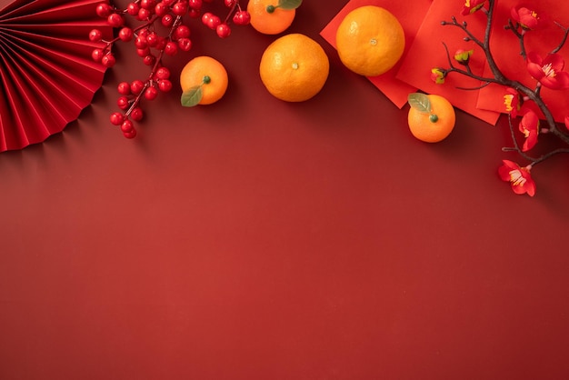 Chinese lunar new year background with fresh tangerine and red envelope