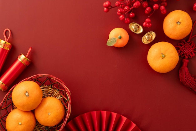 Chinese lunar new year background with fresh tangerine and red envelope