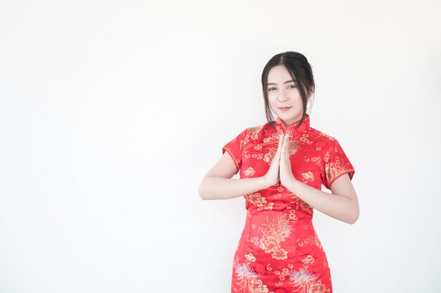 Chinese New Year. Asian women do exciting gestures.