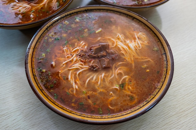 Chinese noodle with beef in spicy soup