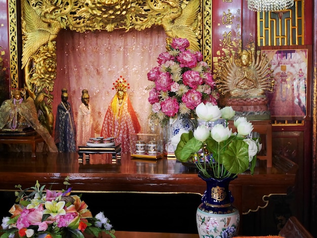 Chinese shrine of Lady princess Soi Dok Mak Betel Nut Blossom a local goddess for people praying in Wat Phanan Choeng temple at Ayutthaya Thailand