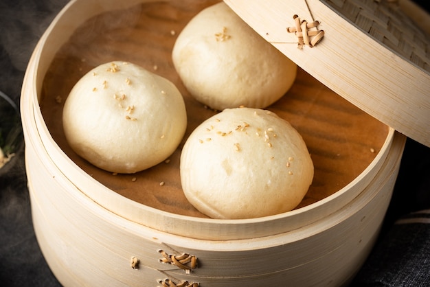 Photo chinese steamed buns baozi with steamer