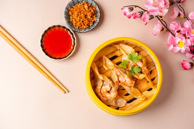 Chinese steamed dimsum in bamboo containers traditional cuisine