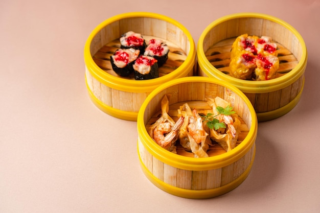 Chinese steamed dimsum in bamboo containers traditional cuisine