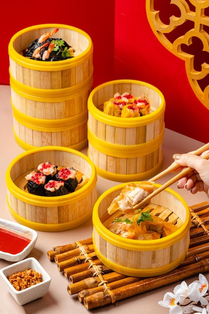 Chinese steamed dimsum in bamboo containers traditional cuisine