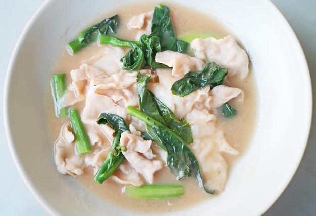 Chinese Style Rice Noodles with Pork and Kale in Gravy A Popular Dishes in Thailand