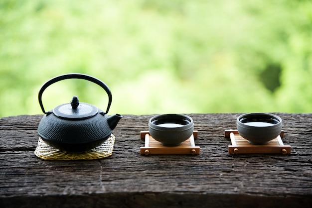 Chinese tea set oriental drink style on Natural green