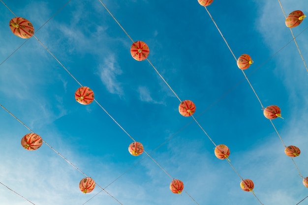 Chinses lanterns. - Vintage tone image of chinese lanterns under blue sky background.