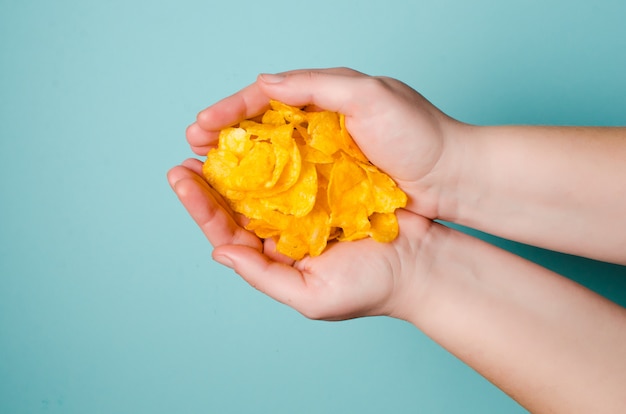 Chips in a female hand