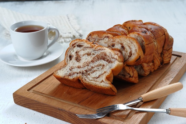 chocolate Babka or Brioche Bread-chocolate swirl bread, sliced on white background.