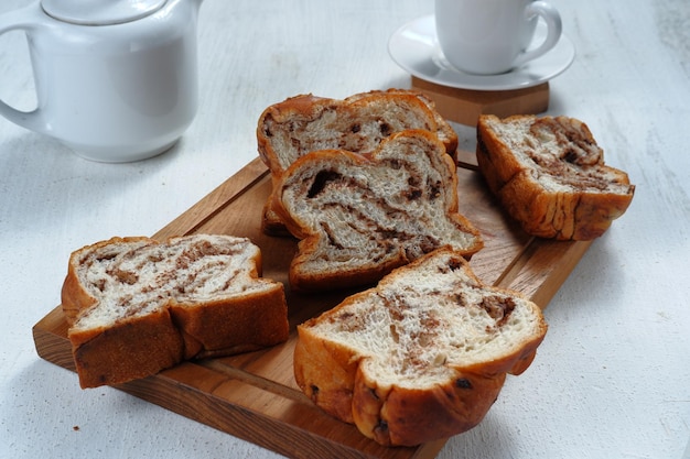 chocolate Babka or Brioche Bread-chocolate swirl bread, sliced on white background.