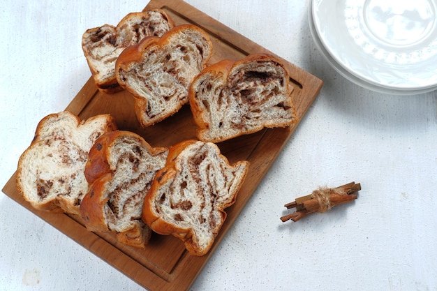 chocolate Babka or Brioche Bread-chocolate swirl bread, sliced on white background.