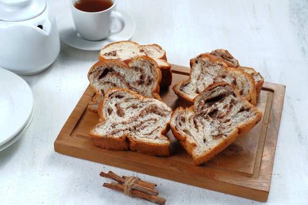 chocolate Babka or Brioche Bread-chocolate swirl bread, sliced on white background.