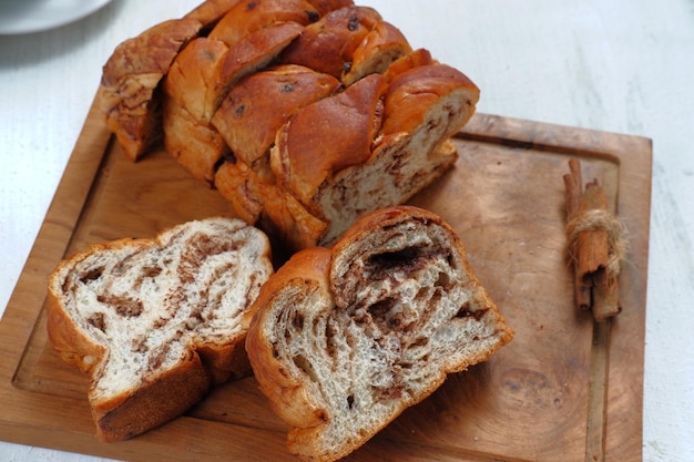 chocolate Babka or Brioche Bread-chocolate swirl bread, sliced on white background.