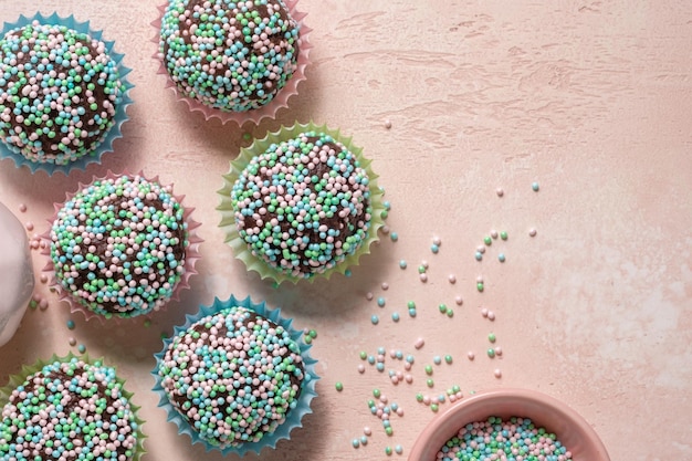 Chocolate ball covered with colorful sugar sprinkles