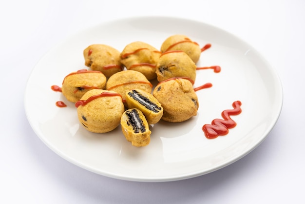 Chocolate biscuit pakora pakodas or fritters creative Indian teatime snack