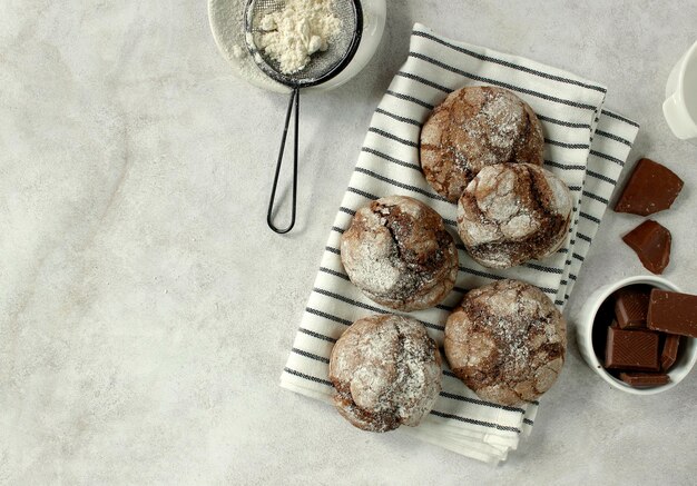 Chocolate brownie cookies in powdered sugar Chocolate Crinkles Copy space