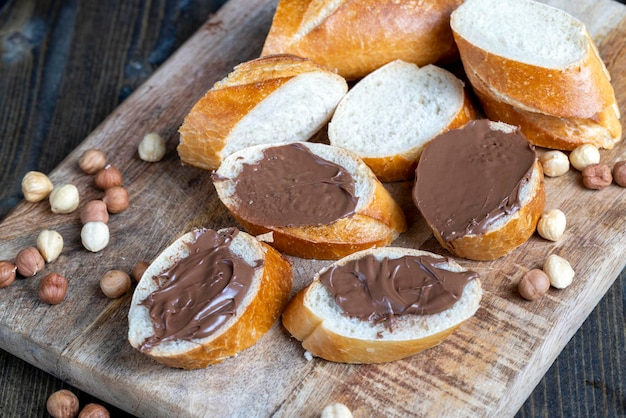 Chocolate butter spread on a baguette close up