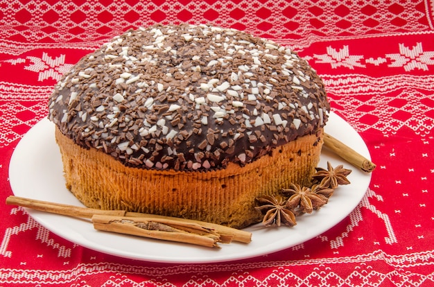 Chocolate cake on Christmas patterned cloth 