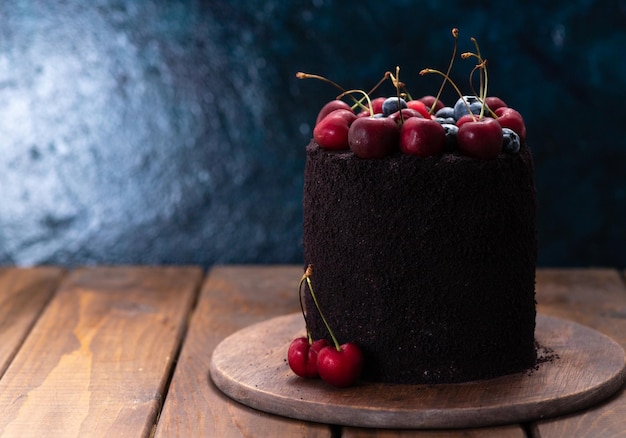 chocolate cake decorated with berries.