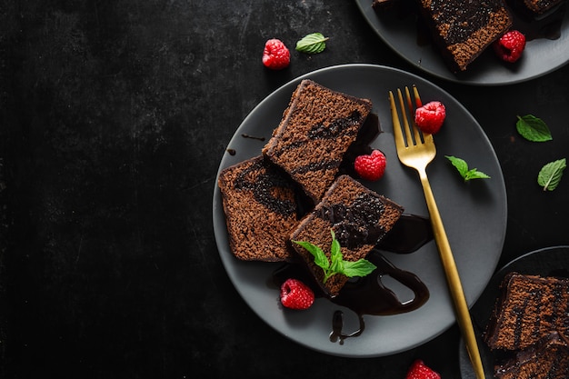 Chocolate cake served with chocolate sauce