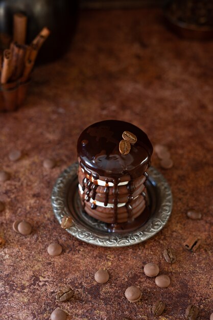 Chocolate cake with coffee beans and chocolate drops