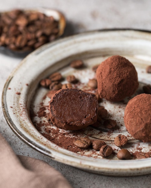 Chocolate candies Delicious dessert on a light background Coffee truffles Macro photography