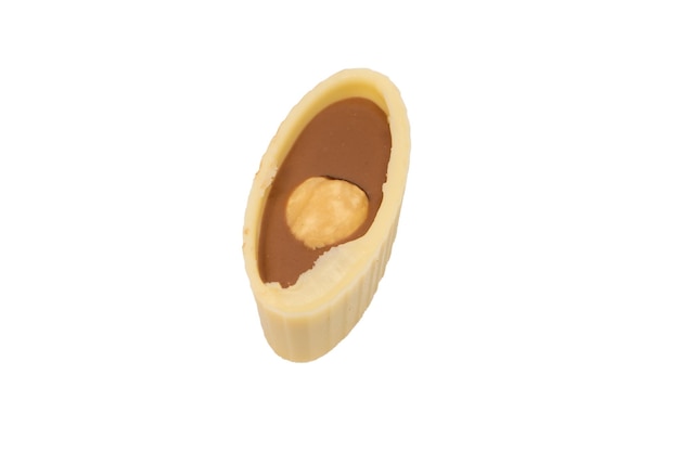 Photo chocolate candy with a nut isolated on a white background