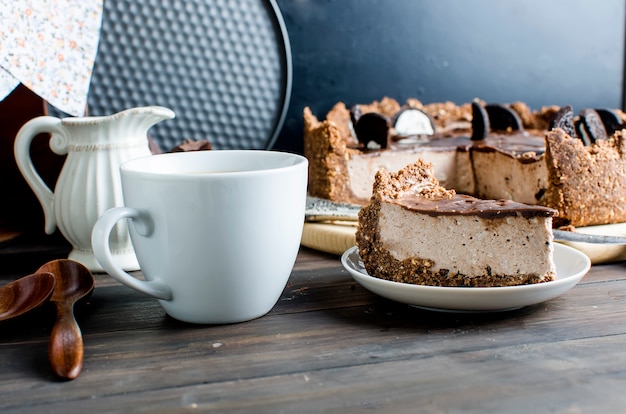 Chocolate cheesecake and cup of coffee