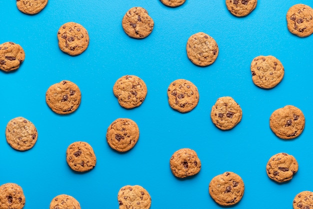 Chocolate chip cookies on blue background. 