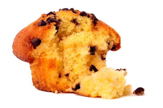 Chocolate chip muffin isolated on white.