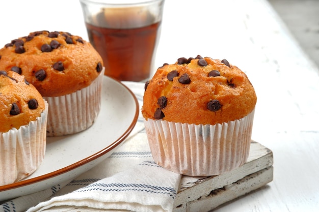 chocolate chipmuffins on white background