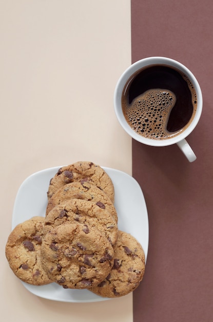 Chocolate chips cookies and a cup of coffee on the table