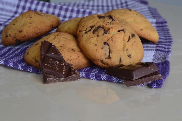 chocolate and cookies on a purple towel