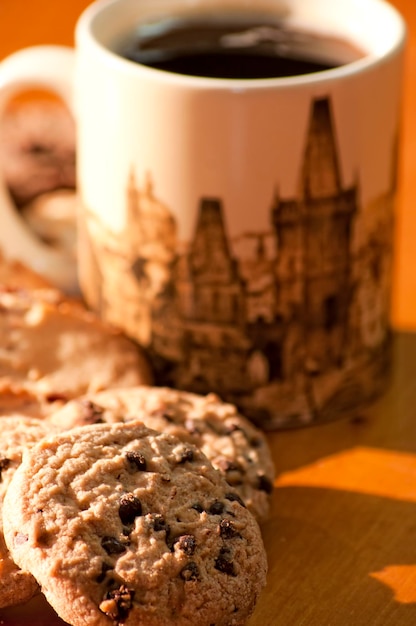 Chocolate cookies with a cup of coffee