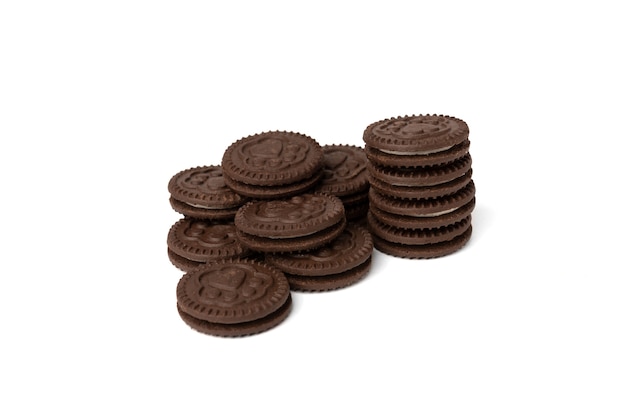 Chocolate cookies with milk filling isolated on white