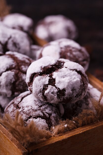 Chocolate Crinkles.Traditional Christmas Baking. Cookies in powdered sugar.