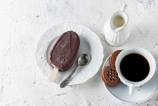 Chocolate ice cream and a cup of coffee