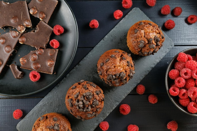 Chocolate muffins with berries and chocolate