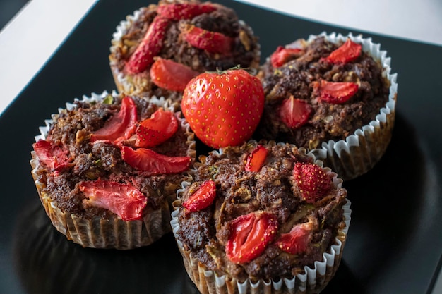 Chocolate Nut Flour Strawberry Muffins for the Keto Diet Black Plate Closeup