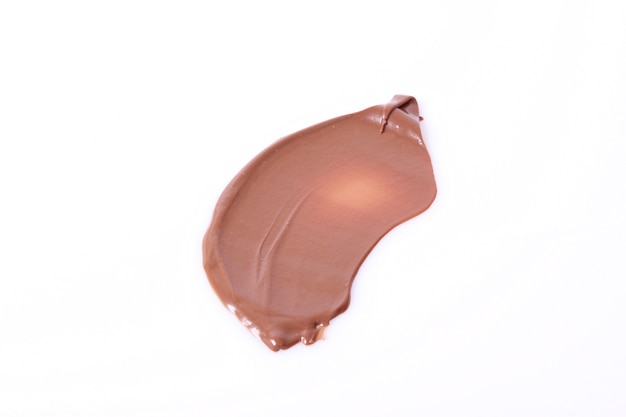 Chocolate paste isolated on white background closeup